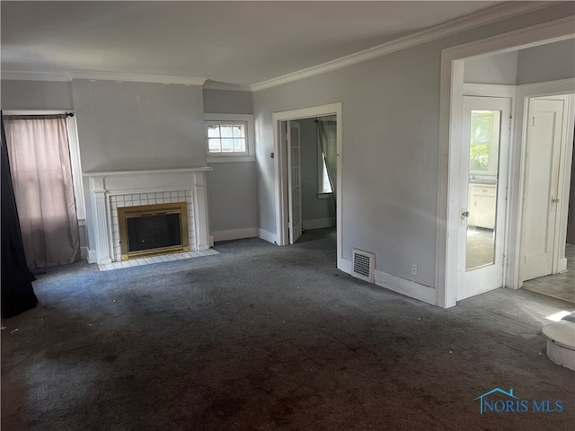 unfurnished living room with carpet floors, a fireplace, and crown molding