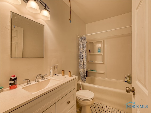 full bathroom featuring shower / bathtub combination with curtain, vanity, and toilet