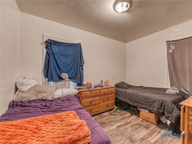 bedroom with light wood-type flooring