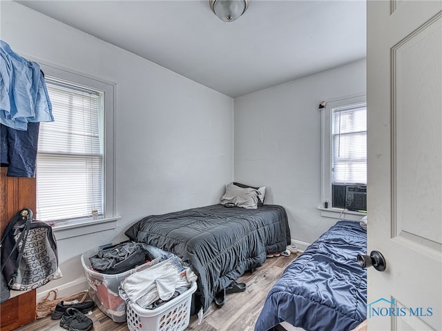 bedroom with light hardwood / wood-style flooring