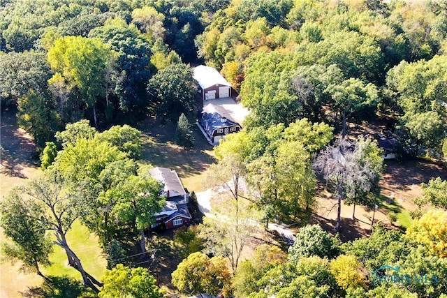 bird's eye view featuring a forest view