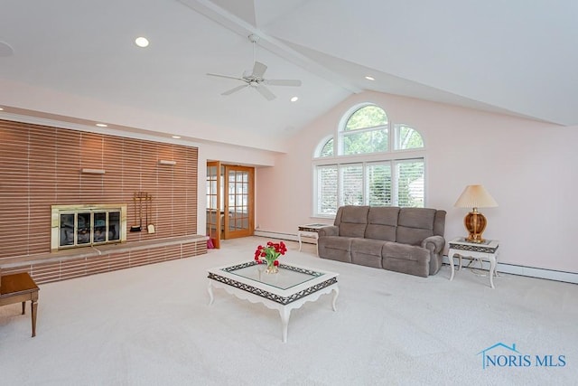 living room with light carpet, baseboard heating, beamed ceiling, and a fireplace