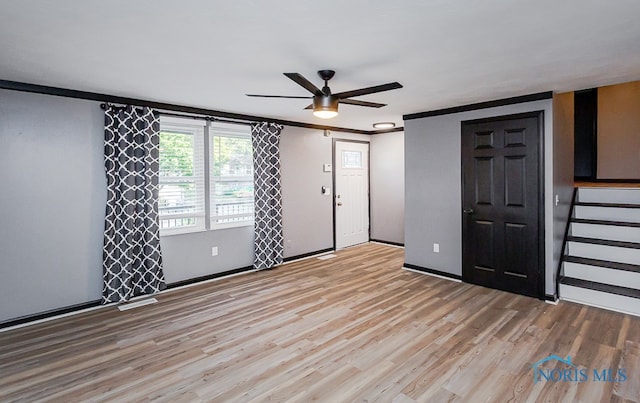 interior space featuring light hardwood / wood-style flooring and ceiling fan