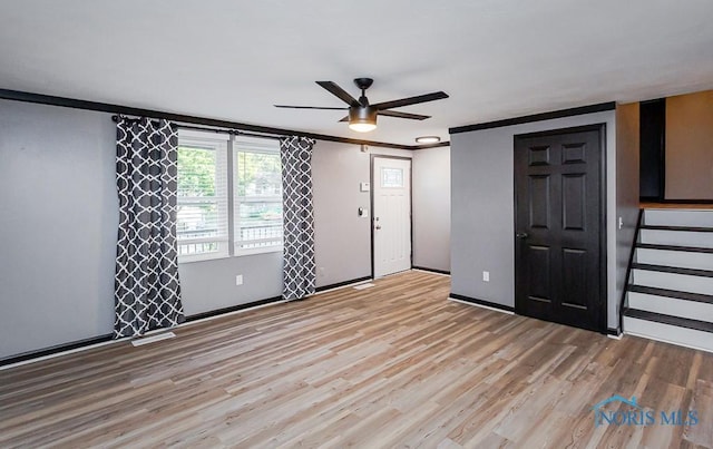 837 Burke Glen Rd, Toledo, OH 43607 - spare room featuring light wood-style flooring, visible vents, a ceiling fan, and baseboards