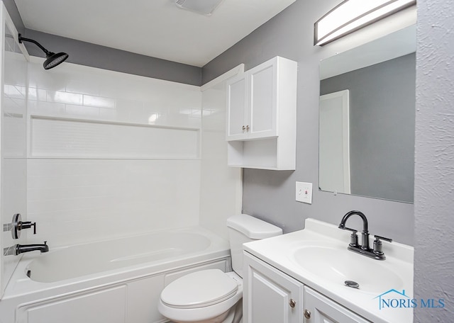 full bathroom with tub / shower combination, vanity, and toilet