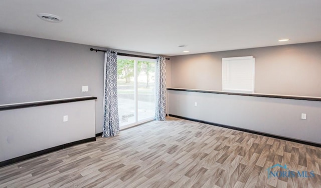 837 Burke Glen Rd, Toledo, OH 43607 - spare room with recessed lighting, wood finished floors, visible vents, and baseboards