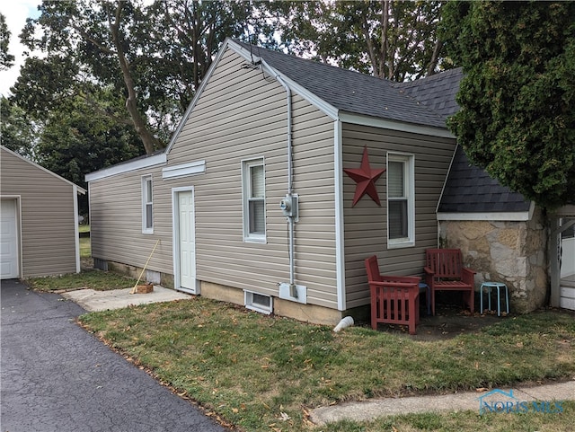 exterior space with a front lawn