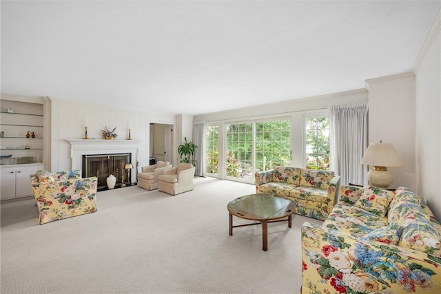 carpeted living room with crown molding