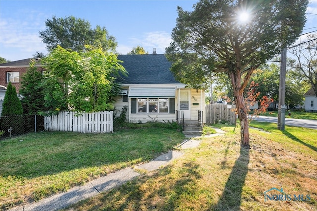 exterior space with a front lawn