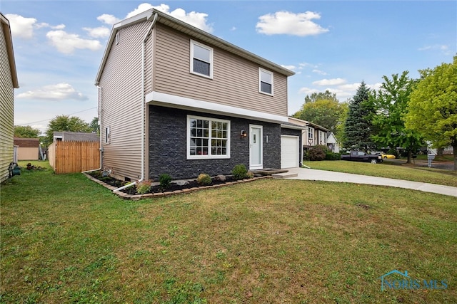 front of property featuring a shed, a garage, and a front yard