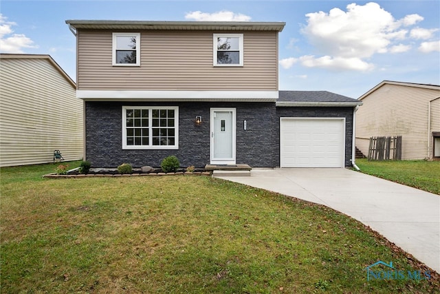 view of front property featuring a garage and a front lawn