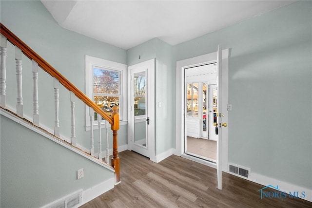 entrance foyer with light hardwood / wood-style flooring