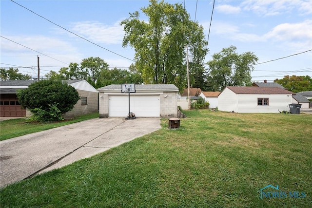 garage featuring a yard