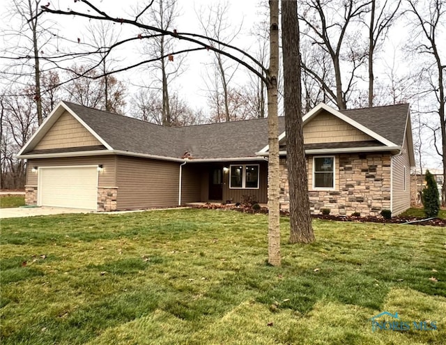 view of front of home with a garage and a front yard