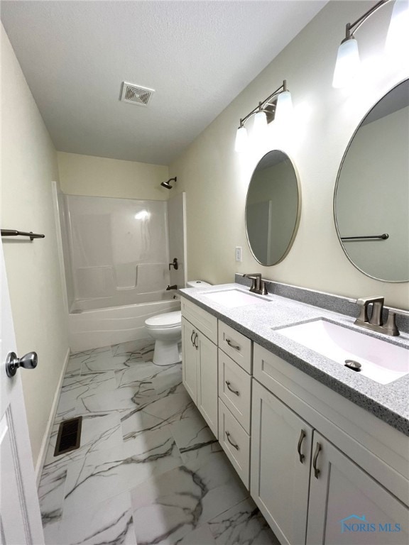 full bathroom with vanity, a textured ceiling, shower / tub combination, and toilet