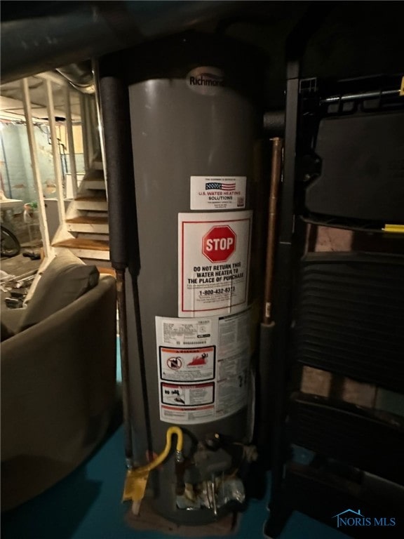 utility room with water heater