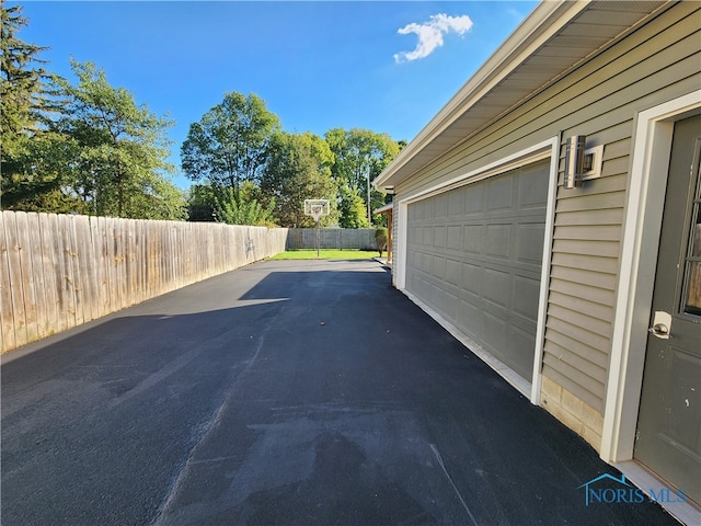 garage with wood walls