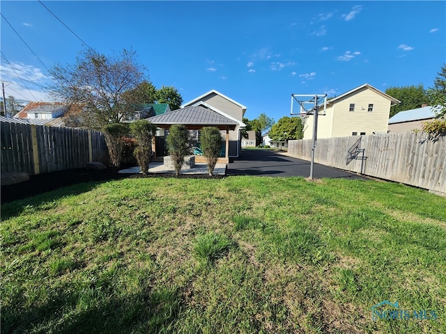 view of yard with a patio and a gazebo