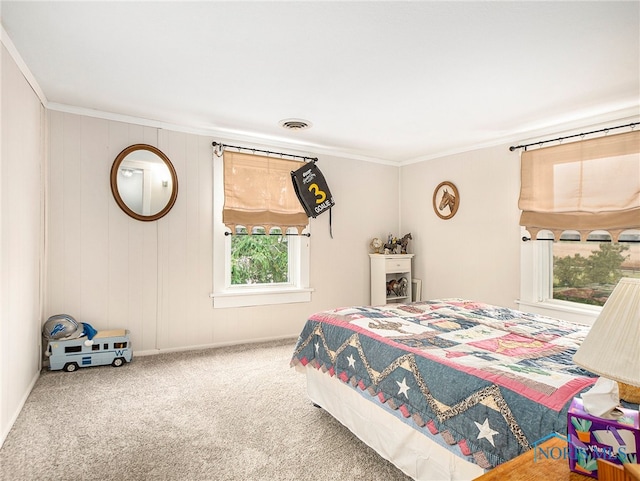 bedroom featuring carpet flooring and crown molding