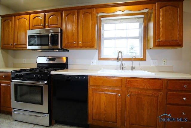 kitchen with appliances with stainless steel finishes and sink