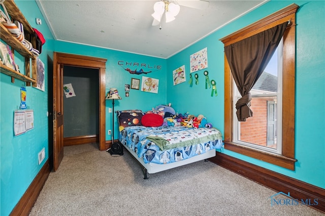 bedroom featuring carpet and ceiling fan