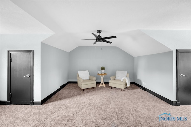 sitting room featuring ceiling fan, lofted ceiling, and carpet