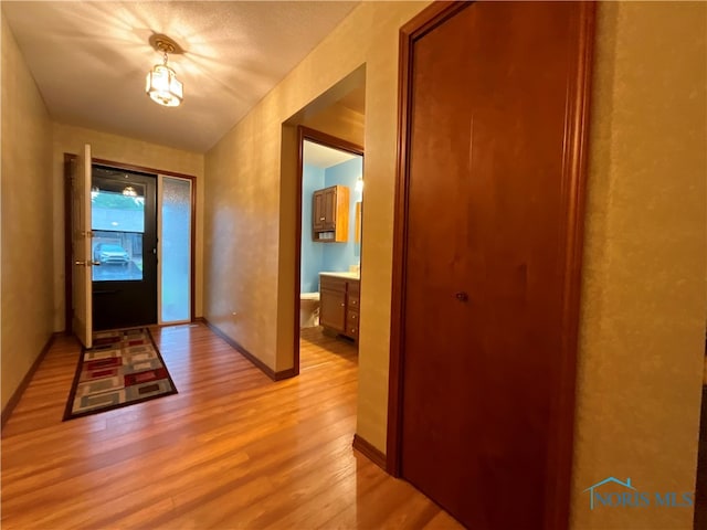 hall featuring light hardwood / wood-style flooring