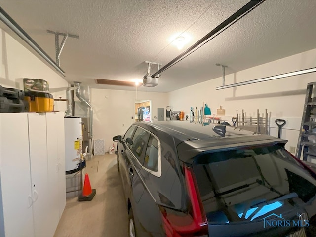 garage featuring gas water heater, a garage door opener, and electric panel