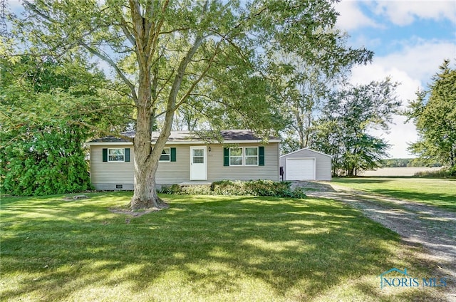 ranch-style home with an outdoor structure, a garage, and a front lawn