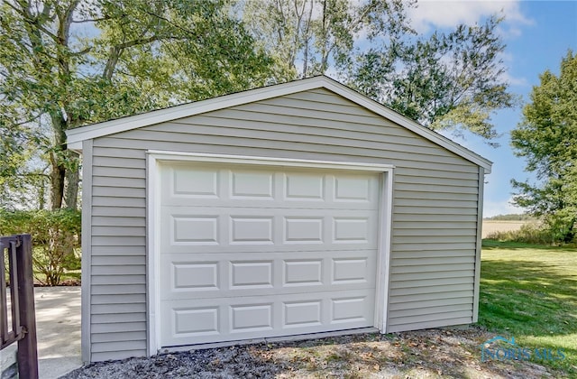 garage with a yard