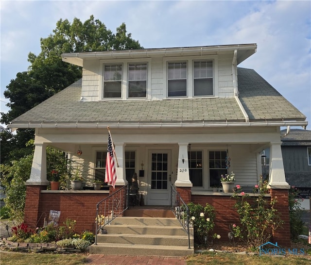 view of front of house featuring covered porch