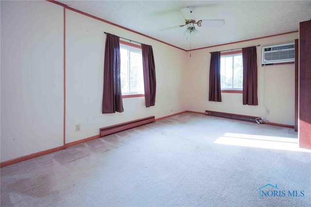 carpeted spare room featuring ornamental molding, ceiling fan, and a baseboard radiator