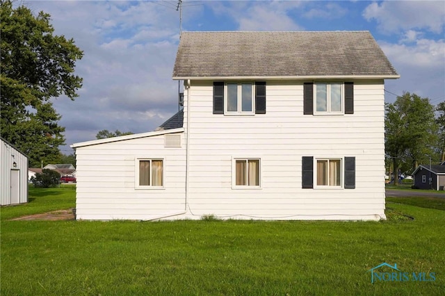 view of property exterior with a yard