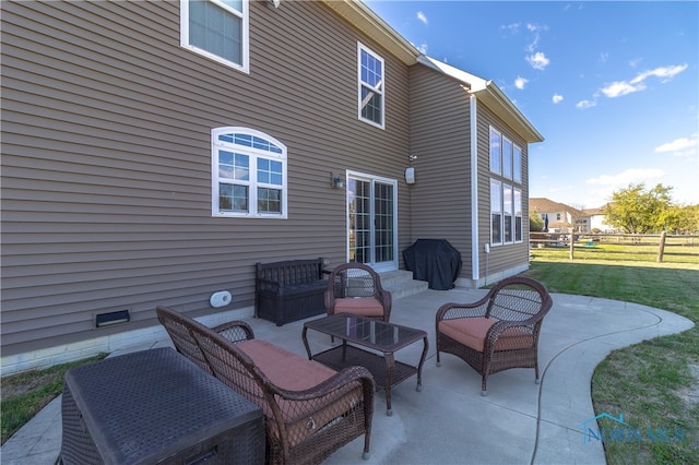 view of patio / terrace with an outdoor hangout area and a grill