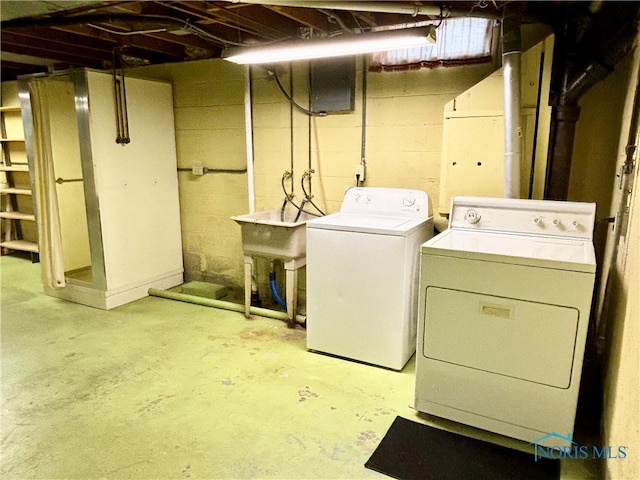 laundry area with washing machine and dryer