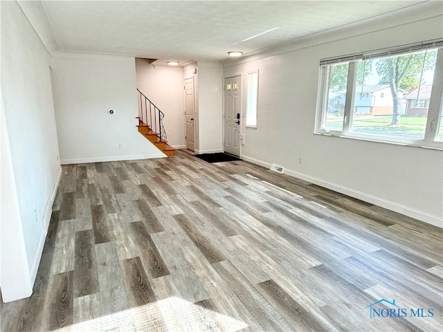 interior space with hardwood / wood-style floors