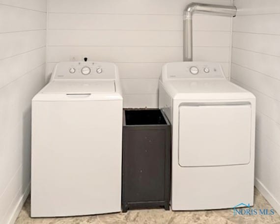 laundry room with separate washer and dryer