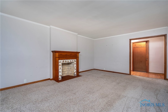 unfurnished living room with crown molding and light carpet