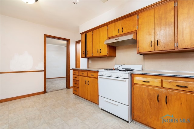 kitchen featuring white stove