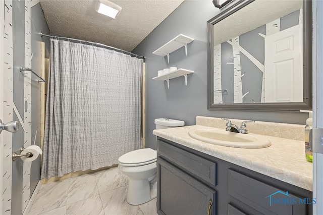 bathroom featuring vanity, toilet, a textured ceiling, and curtained shower