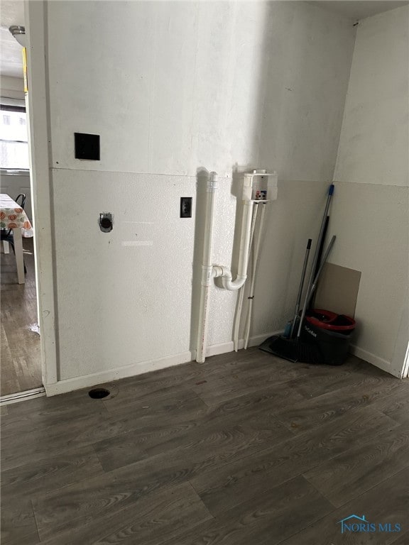 washroom with dark wood-type flooring