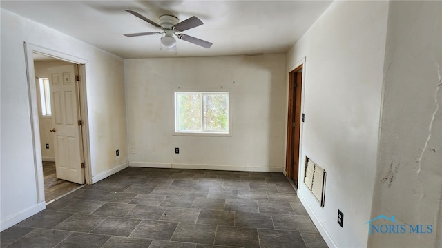 unfurnished room featuring ceiling fan