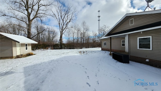 view of snowy yard