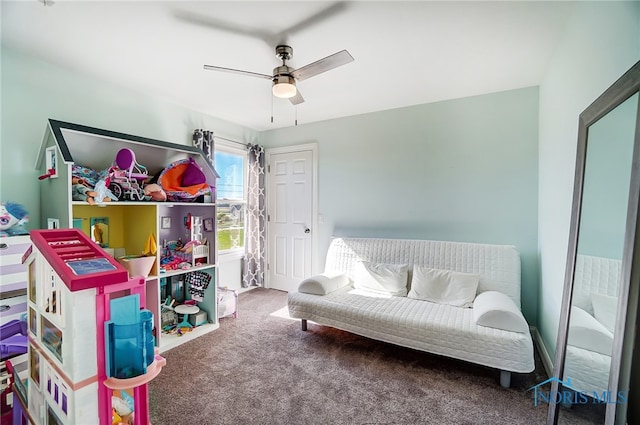 sitting room with carpet floors and ceiling fan