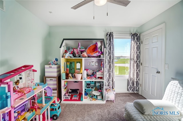 rec room featuring ceiling fan and carpet flooring