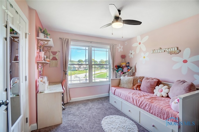 carpeted bedroom with ceiling fan