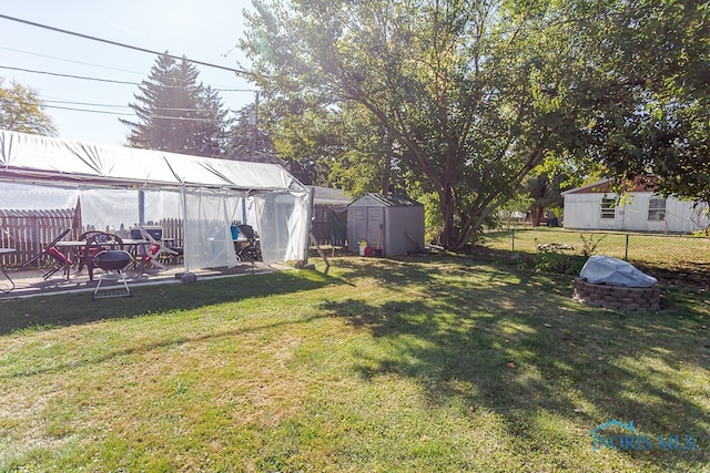 view of yard with a storage shed