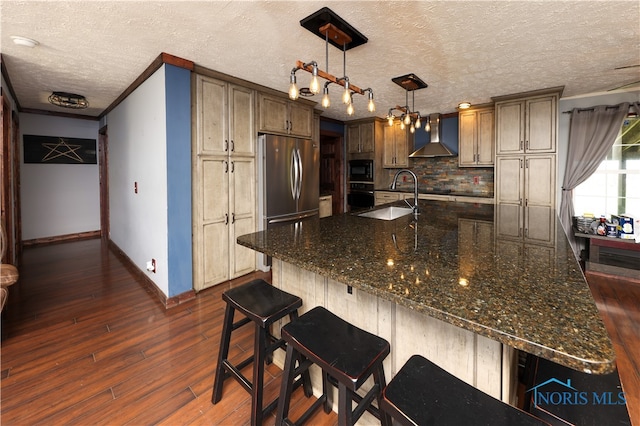 kitchen featuring black appliances, wall chimney exhaust hood, dark hardwood / wood-style flooring, ornamental molding, and a textured ceiling