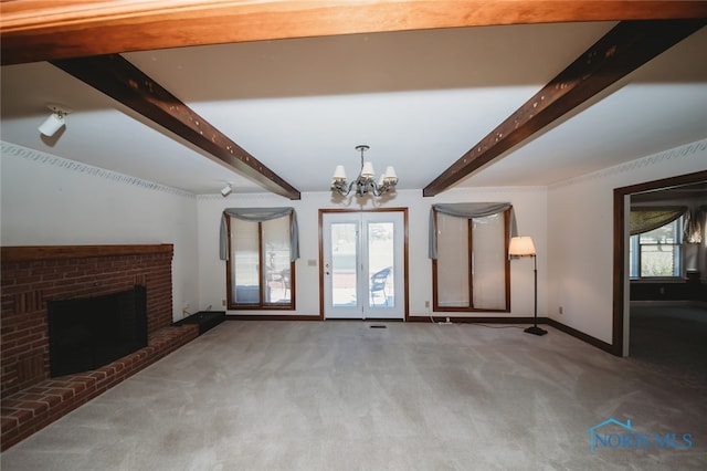 unfurnished living room featuring light carpet, plenty of natural light, and beam ceiling