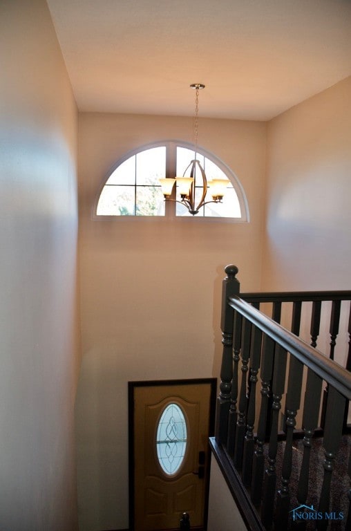 interior space featuring an inviting chandelier